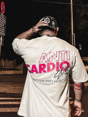White graphic t-shirt with bold pink "ANTI CARDIO CLUB" text and a quote.
