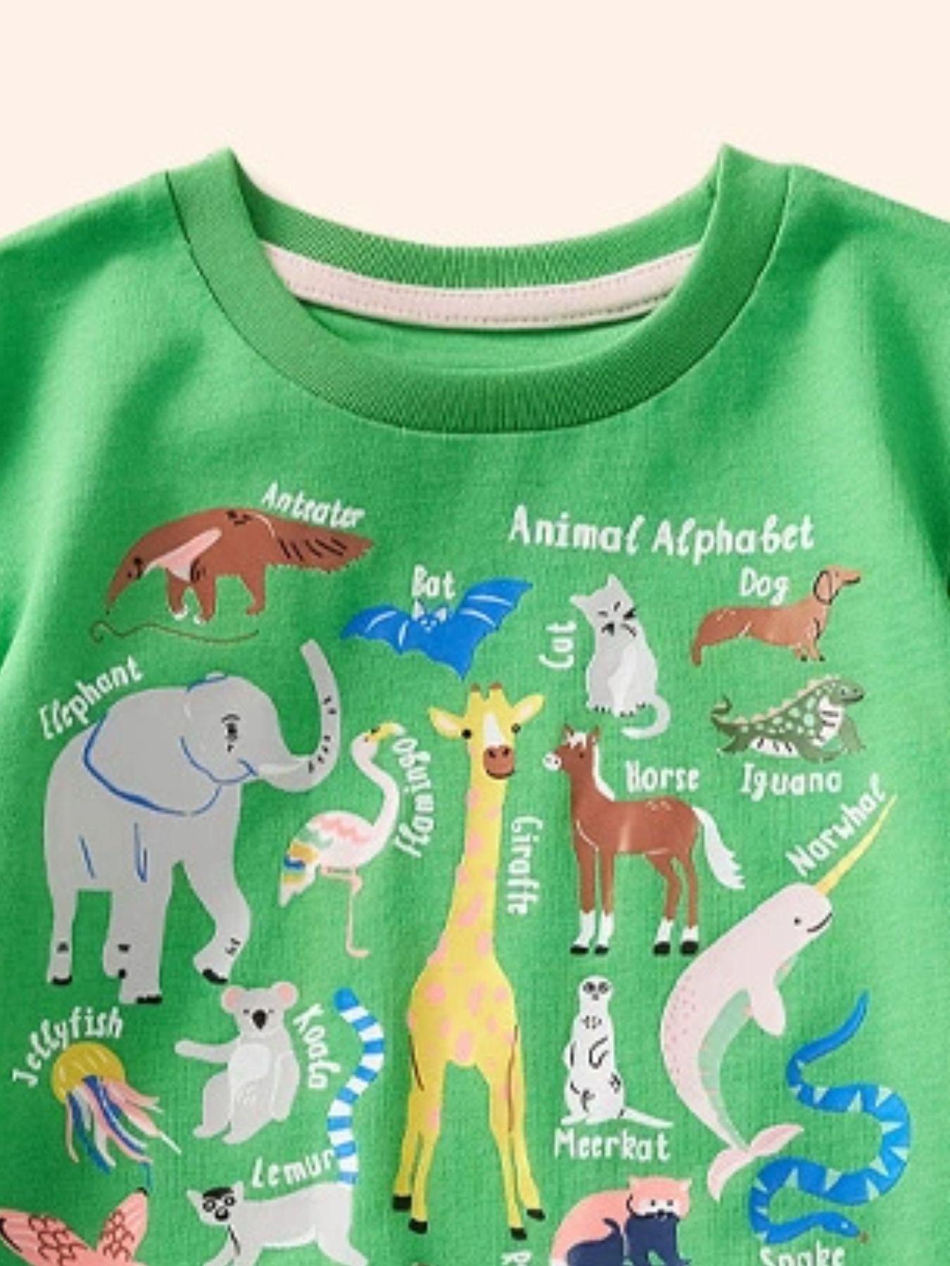 Green cotton t-shirt with playful animal alphabet print and crew neck