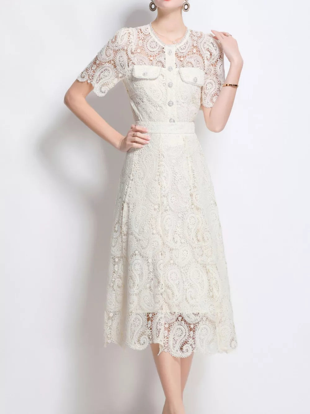 White lace buttoned two-piece dress with short sleeves and midi skirt.