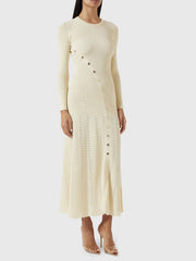 Ribbed knit maxi dress in pastel yellow with decorative buttons and eyelet detail