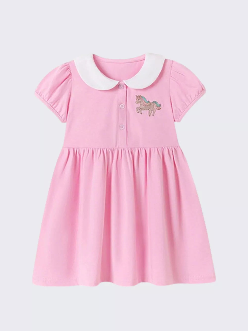 Pink cotton toddler dress with white collar, puff sleeves, and unicorn embroidery.