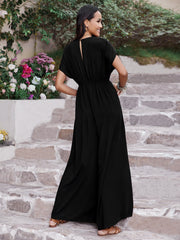 Black wide-leg jumpsuit with flutter sleeves and a keyhole back detail.