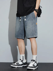 Men's light blue denim shorts with drawstring and loose fit