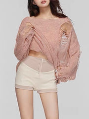 Ripped knit oversized beach pullover in watermelon pink with boat neck and distressed details.