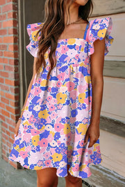 Floral flutter sleeve mini dress with square neck and pockets in a cotton blend.