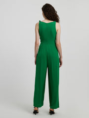 Emerald tie-waist wide leg jumpsuit in mid green with knotted shoulder straps.