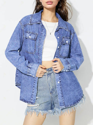 Acid wash denim overshirt in medium blue with two chest pockets and button front.