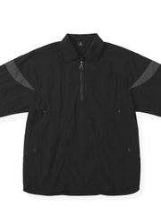 Black quarter-zip polo with contrasting shoulder panels and two front pockets.