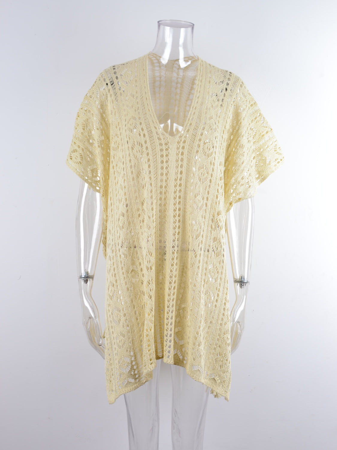 Cream open-knit V-neck beach cover-up with short sleeves and a relaxed fit.