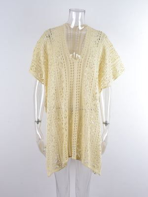 Cream open-knit V-neck beach cover-up with short sleeves and a relaxed fit.