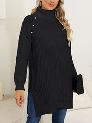 Black ribbed turtleneck tunic with pearl button detail on shoulder, side slits