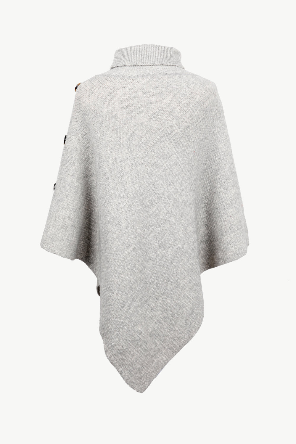 Light gray acrylic turtleneck knit poncho with button details on the shoulder.