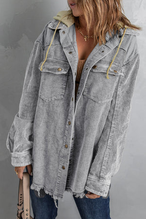 Gray corduroy utility jacket with hood, button front, chest pockets, and frayed hem.