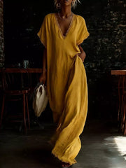 Yellow lace-trimmed V-neck maxi dress with pockets and short sleeves.