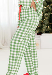 Light green gingham pajama pants with red trim and tie detail