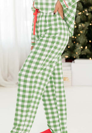 Light green gingham pajama pants with red trim and tie detail