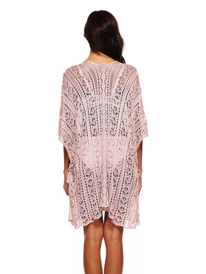 Blush pink crochet v-neck beach cover-up with intricate cutout pattern and short sleeves.