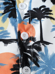 Toddler shirt with tropical palm tree print, white buttons, cotton fabric.