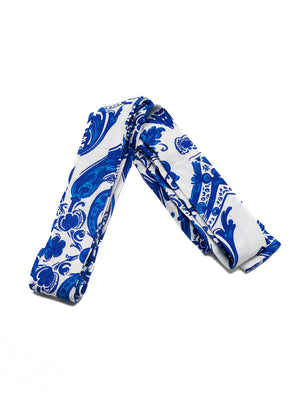 Crisscross halter neck maxi dress in blue and white ornate floral print.