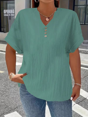 Green textured plus size V-neck t-shirt with decorative buttons and short sleeves.