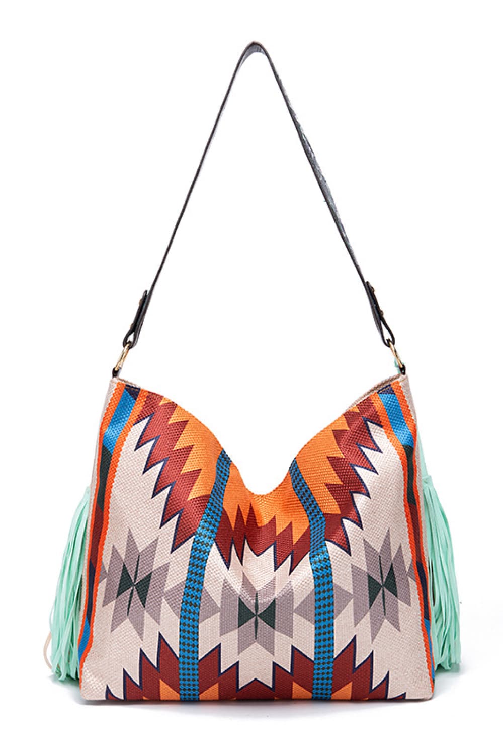 Southwestern fringe hobo bag with geometric pattern and mint green fringe detail.