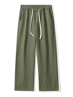 Relaxed fit military green cotton drawstring pants with elastic waistband and side pockets.