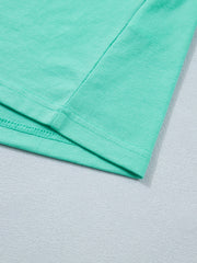 Eyelet lace ruffled cap sleeve top in mint green cotton blend fabric detail.