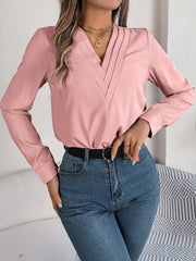 Dusty Pink V-neckline blouse with pleated detail and long sleeves.