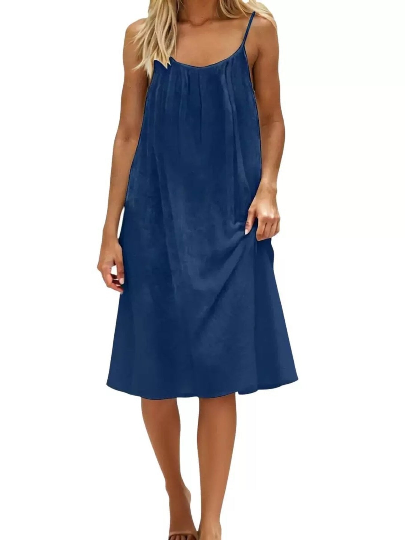 Dark blue spaghetti strap midi dress with a gathered neckline and A-line skirt.