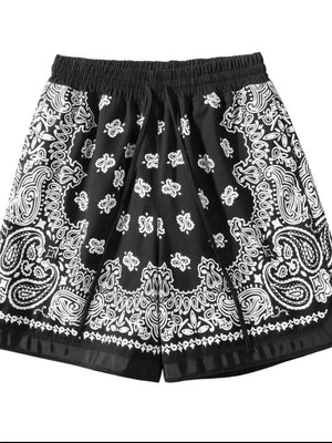 Black bandana print sport shorts with metallic trim and drawstring waist.