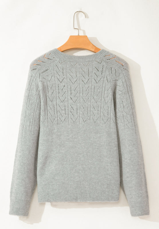 Gray lace-effect knit button-down cardigan with chevron pattern detail.