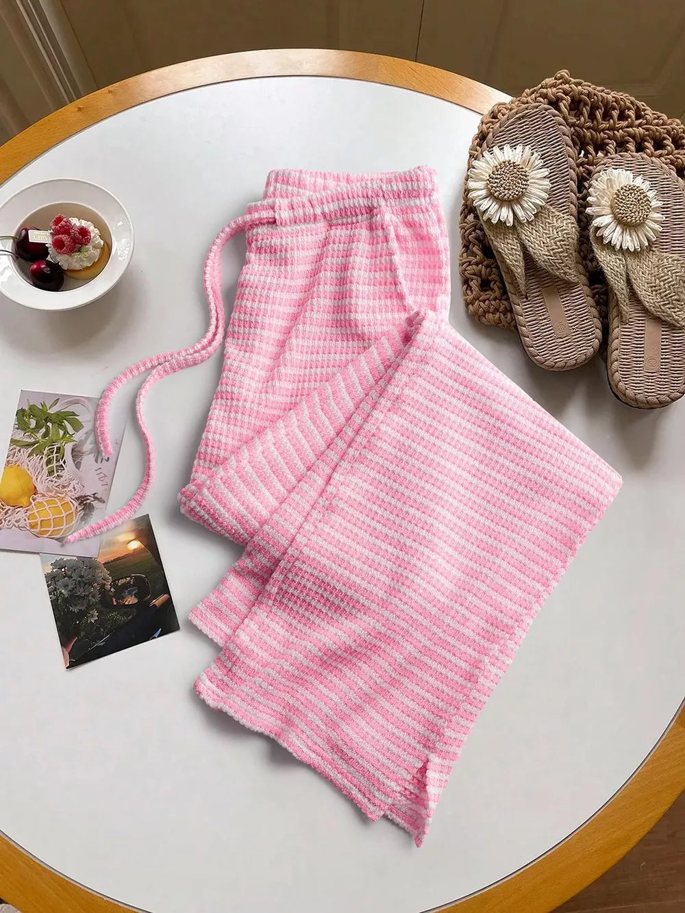 Pink striped maternity wide leg pants with drawstring waist