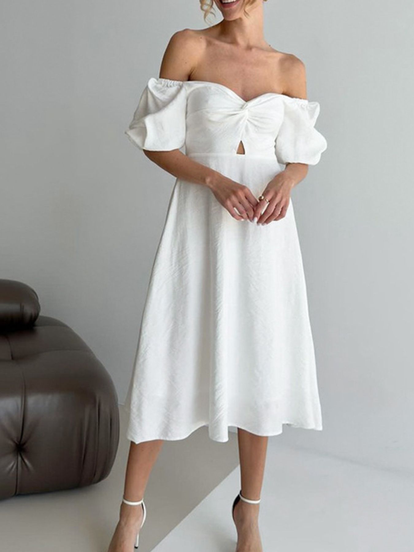 White off-shoulder midi dress with twisted bodice and cutout detail