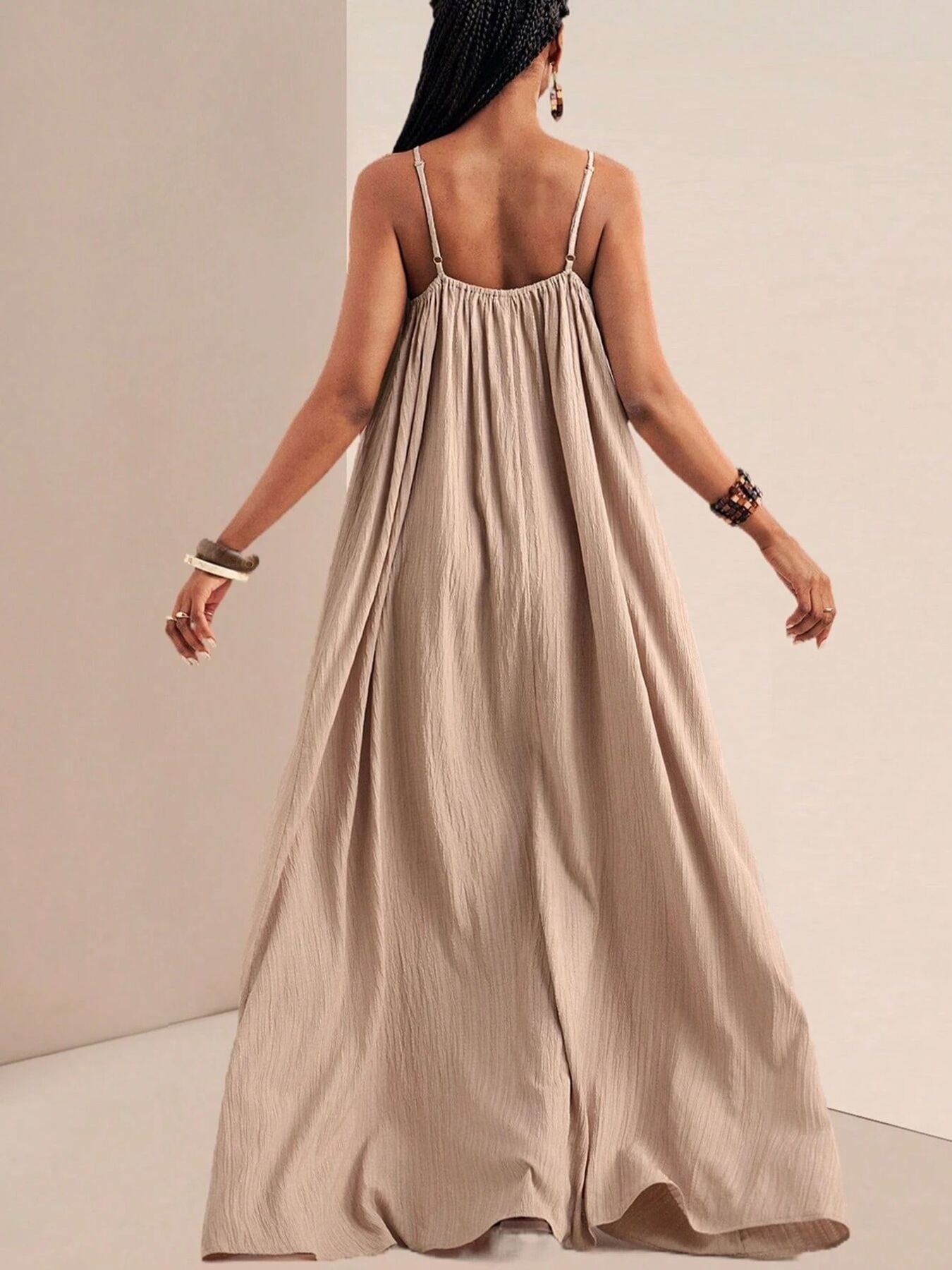 Khaki maxi swim dress with adjustable spaghetti straps and gathered bust detail.
