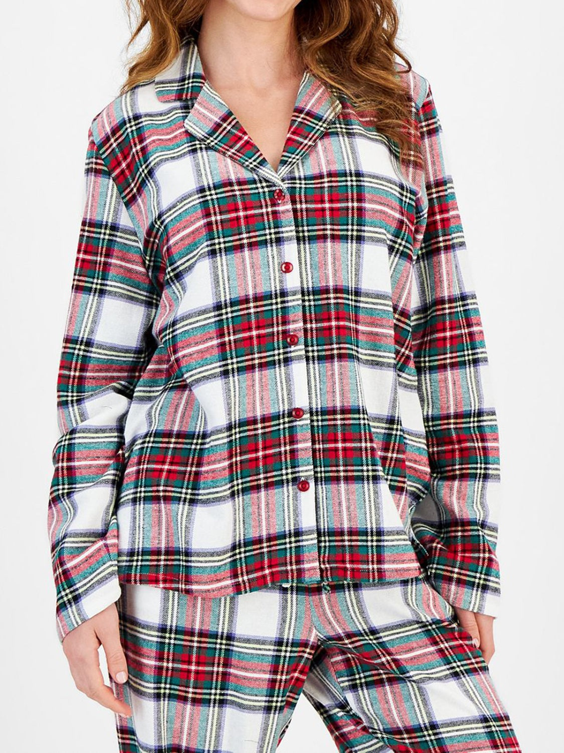 Pajama set with red, green, and white plaid pattern, button-up top and pants.