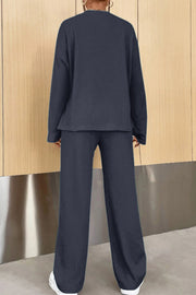 Dark Blue ribbed henley set with long sleeves and wide leg pants.