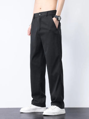 Relaxed fit black cargo pants with elastic waistband and side pockets.