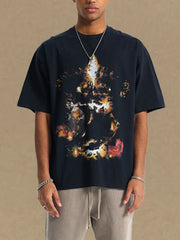 Black oversized t-shirt with abstract fiery graphic print and crew neck.