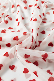 Sheer white t-shirt with red heart print, mesh fabric detail