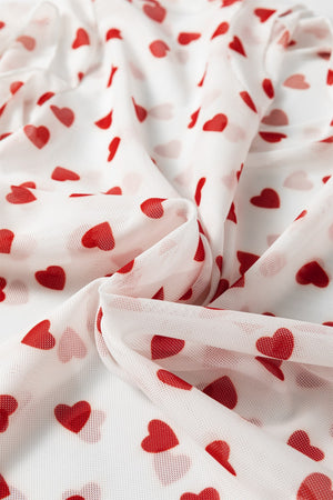 Sheer white t-shirt with red heart print, mesh fabric detail