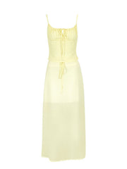 Apricot cami set with tie-front detail and a maxi skirt.