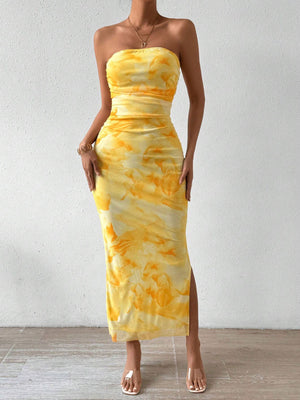 Yellow tie-dye ruched strapless midi dress with a thigh-high slit