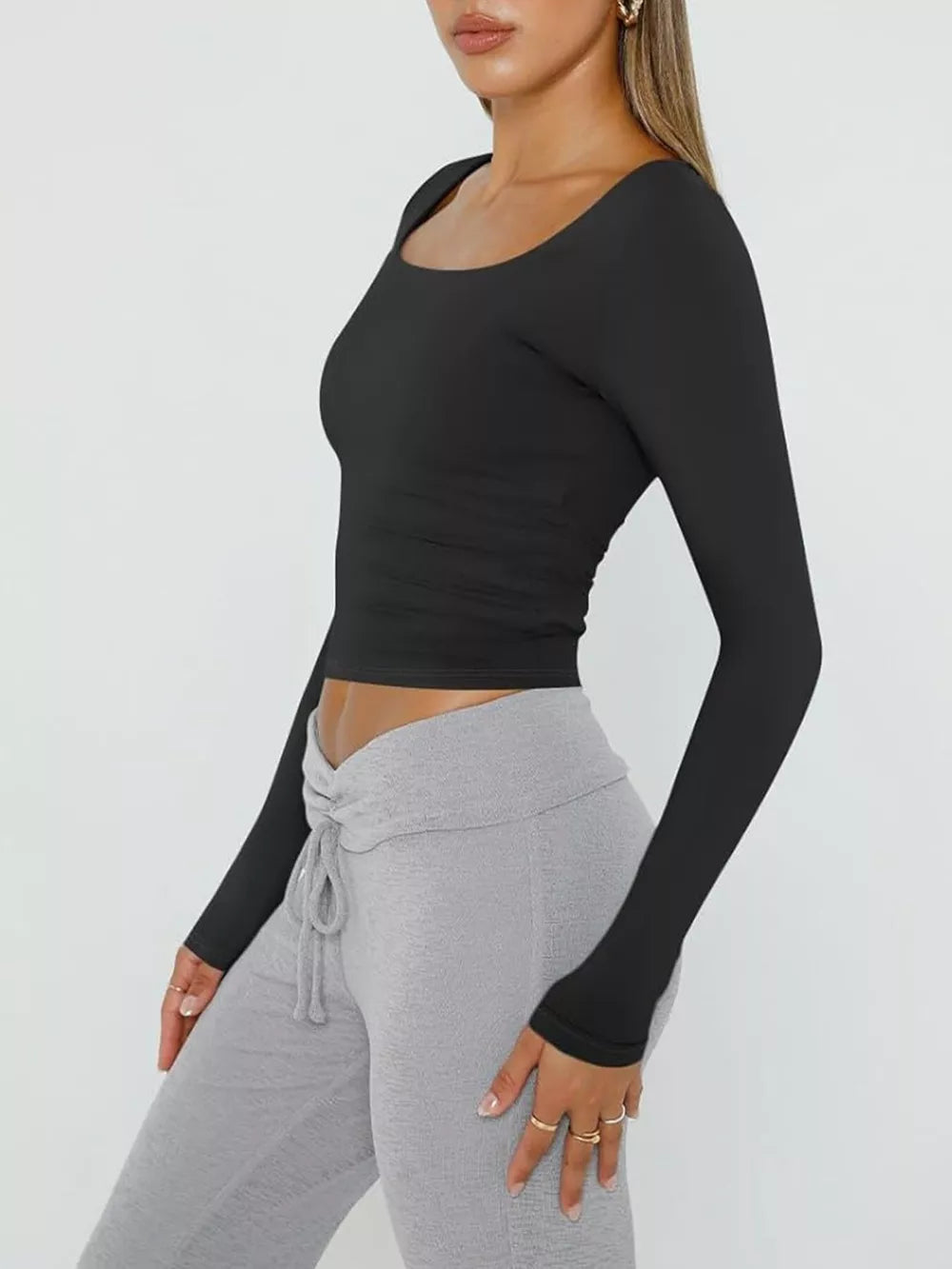 Black long sleeve slim-fit cropped t-shirt with square neckline.
