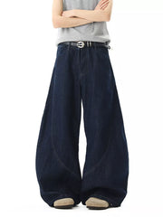 Men's dark wash cotton wide-leg jeans with pockets and curved seam detail.