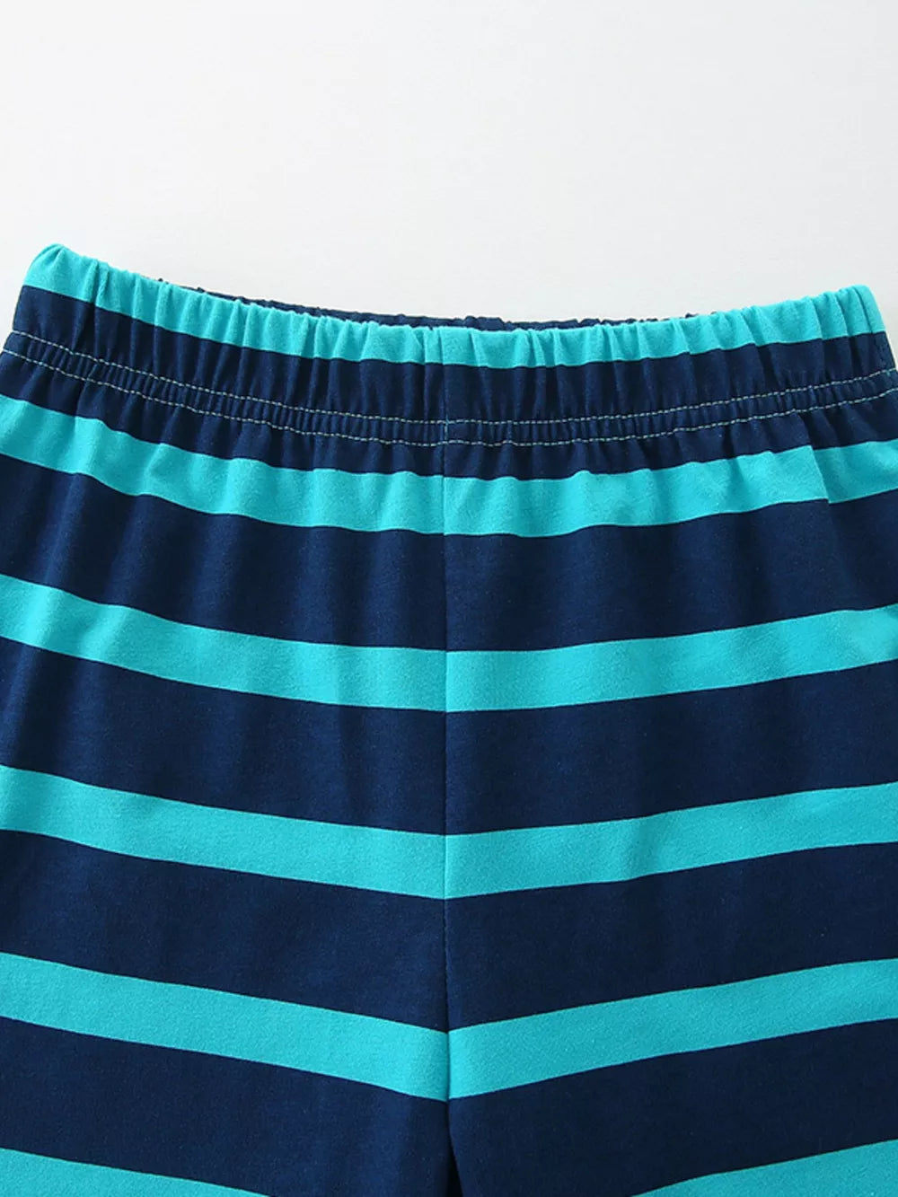Toddler striped shorts with elastic waistband in navy and teal cotton.