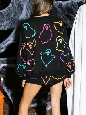 Black loungewear set with colorful ghost appliqués on sweatshirt and shorts.