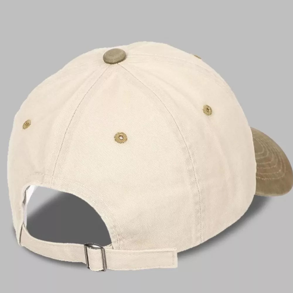 Cream baseball cap with tan brim and adjustable strap
