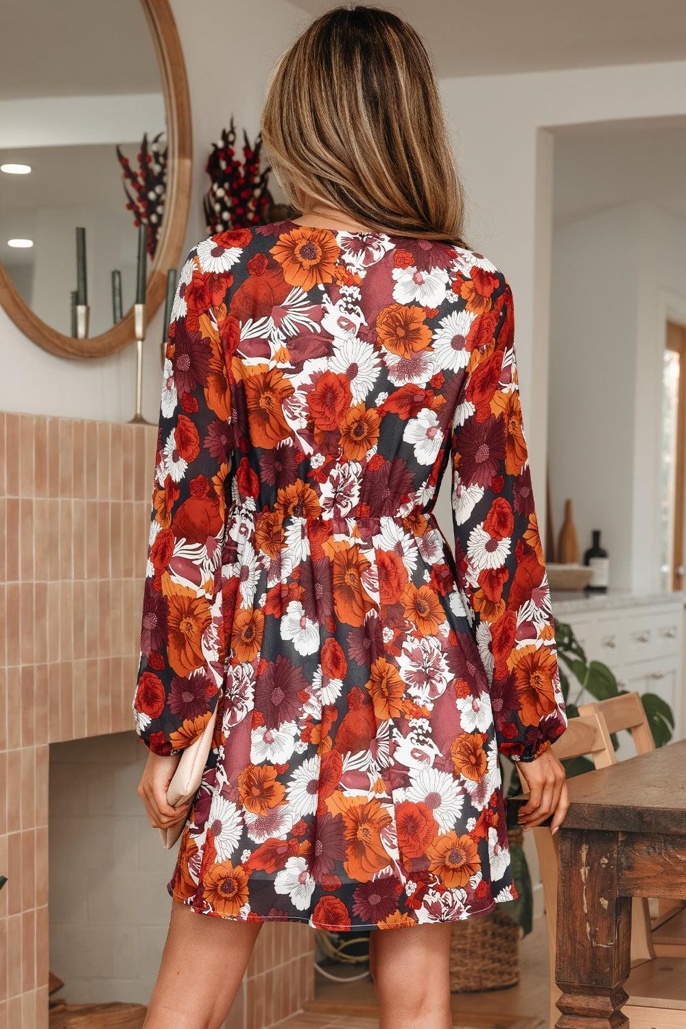 Floral wrap mini dress with puff sleeves in autumn floral print.