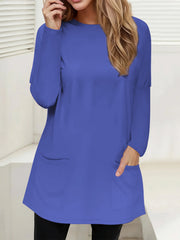 Relaxed fit royal blue tunic with long sleeves and two patch pockets.