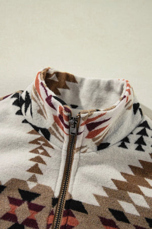 Southwestern quilted zip-up jacket in eggshell with a geometric pattern and stand-up collar.